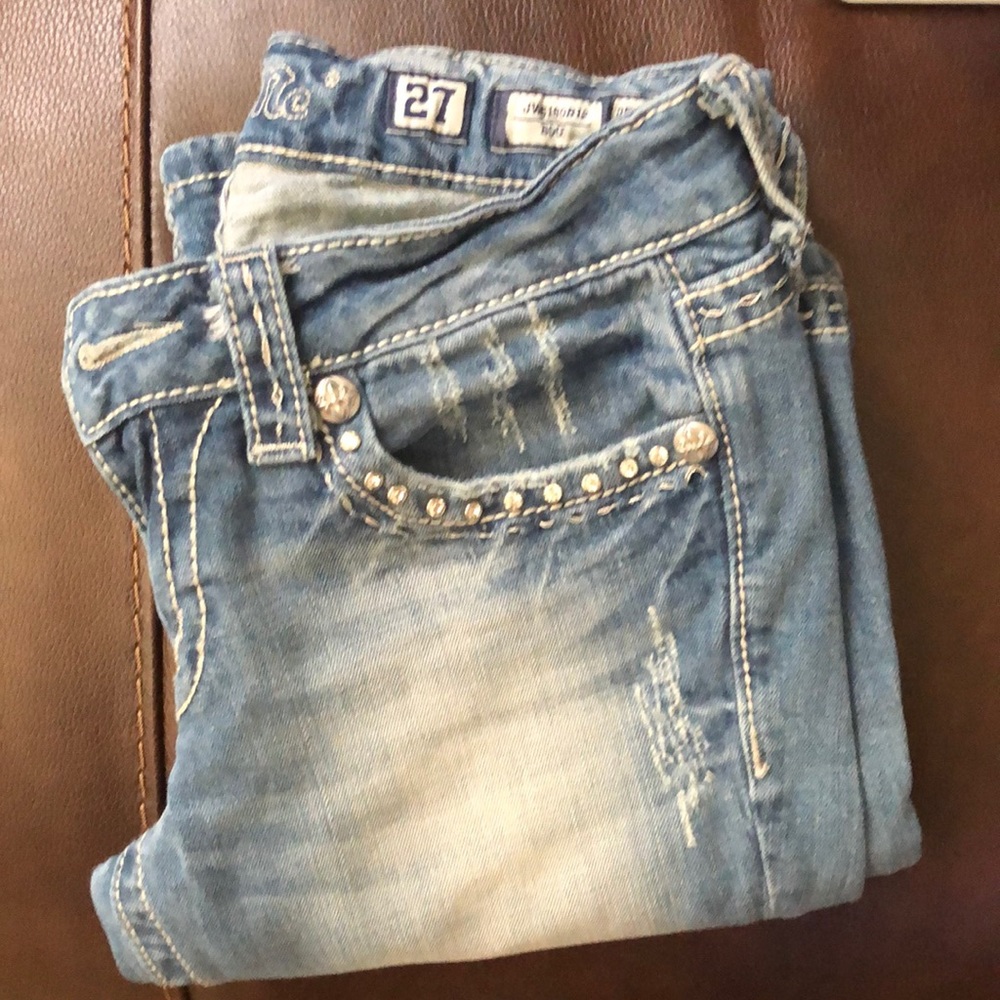 Light wash distressed Miss Me Jeans